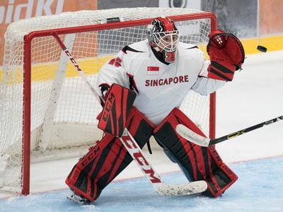 Hockey goalkeeper display defensive posture in the game
